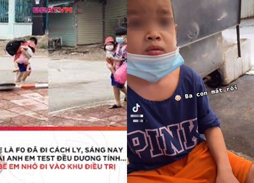 Ba mẹ đều là F0, bé trai cắp nách em nhỏ vào khu cách ly khiến ai nấy xót xa