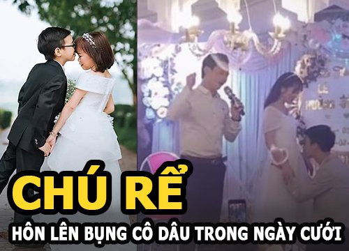 Chú rể hôn lên bụng cô dâu trong ngày cưới khiến cả hội trường xúc động