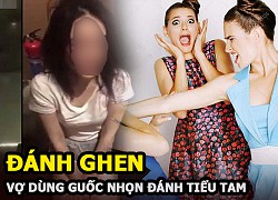 Đánh ghen kinh hoàng: Vợ đè chặt "tiểu tam" xuống đường, dùng guốc nhọn đánh liên tục vào người