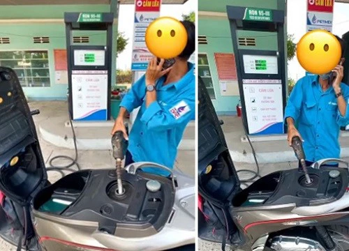 Nhân viên cây xăng vừa đổ xăng cho khách, vừa "buôn" điện thoại gây bức xúc