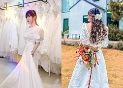 HOT: Tran My shows off a picture of a lovely wedding dress, about to get on a flower car?