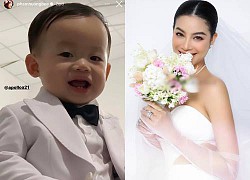 Pham Huong shows off her youngest son wearing a dashing vest that looks exactly like his father, excited to take wedding photos with his mother