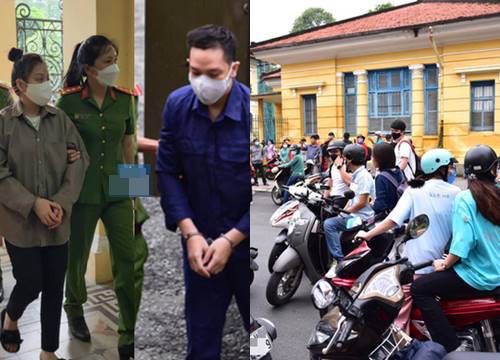 Vẻ mặt thất thần của dì ghẻ và cha ruột bạo hành bé gái 8 tuổi đến chết tại tòa chờ xét xử