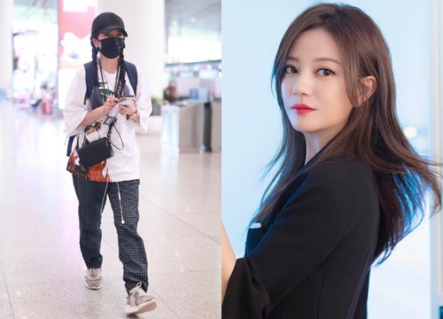 Trieu Vy dressed young, relaxed spirit appeared at the airport after a year of being banned