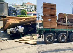 Dozens of broken plywood panels fell down, hitting a motorcyclist in Binh Duong