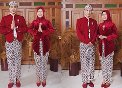 Dat Villa wears a bright red dress in a series of wedding photos with an Indonesian bride, claiming to show photos every day