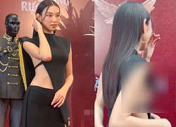 Thuy Tien wears a revealing skirt, stands at an angle to reveal the first round of objections at Dam Vinh Hung&#39;s event