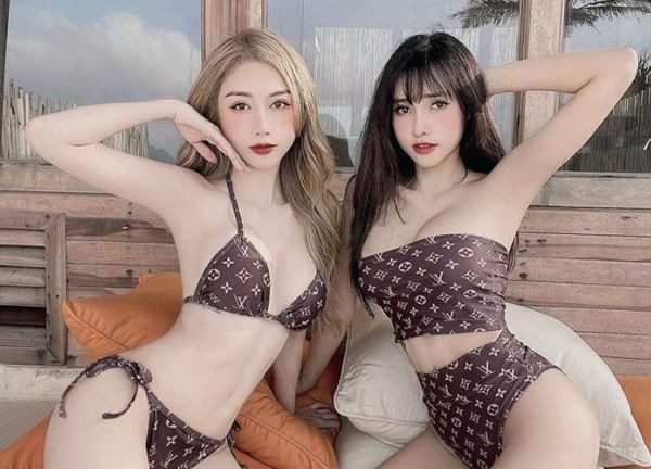 Xuất hiện cặp chị em đẹp như thiên thần, cùng diện đồ cắt xẻ đi chơi bắn súng