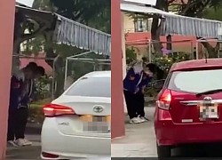 Students waited at the gate, bowing to teachers as they drove into school in the cold