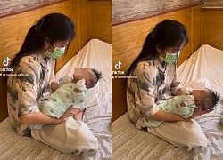 Nam Em holds the baby after suspected miscarriage, affirming that this is "motivation" every day