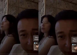 Nam Em, sitting next to her husband-to-be, livestreamed and still "pretends" to confirm that he has not returned