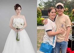 The daughter of the late Artist Vu Linh suddenly showed off a photo of her bridal dress in the midst of a noise with Vu Luan