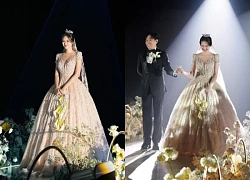 Anh Duc's wife wears a wedding dress with 1000 crystals, holding a unique and rare wedding bouquet