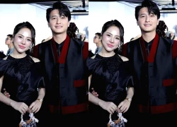 Huỳnh Anh và vợ hơn 6 tuổi mặc đồ đôi, tình tứ trên thảm đỏ ở Hà Nội