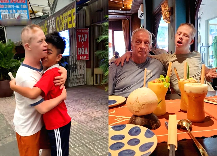 A foreign boy with Down syndrome touched hearts as Vietnamese children hugged and kissed him in the street.