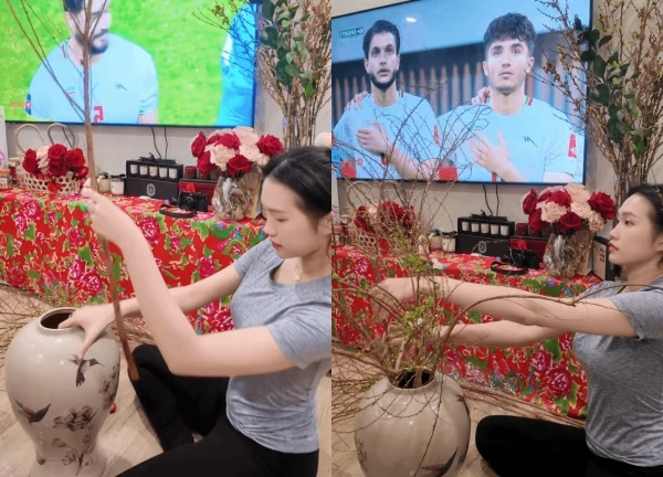 Doan Van Hau's wife wears a flower-filled T-shirt and is immediately given 0 points by the online community.