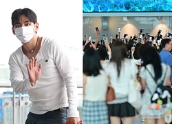 V (BTS) hoảng loạn ôm mặt giữa biển "fan cuồng", sân bay Incheon vỡ trận!