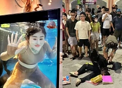 "Aquarium Hotgirl" Ngan Baby goes crazy in the middle of the street, netizens are shocked!