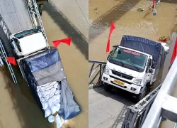 Xe tải chở gạo rơi khỏi Cầu 30 Tháng 4 tại Cần Thơ, giao thông tê liệt