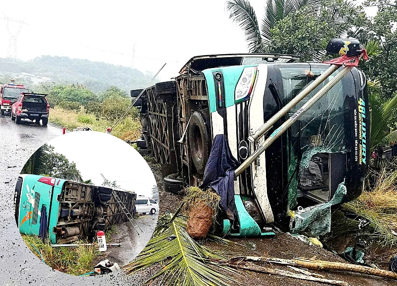 Horrifying moment: Passenger bus carrying 32 people loses control and overturns on National Highway 14.